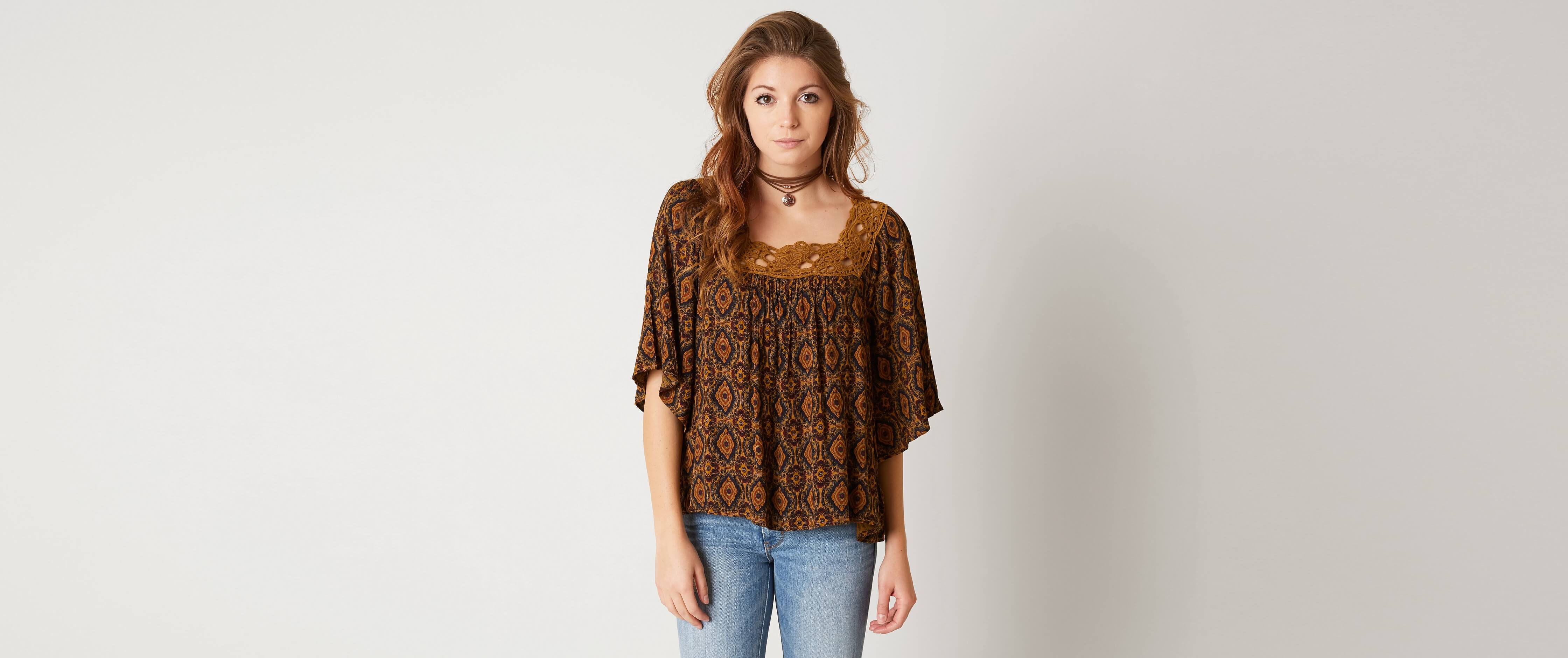 Image of Gimmicks Tulip Back Top