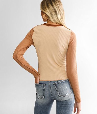 Gilded Intent Exposed Seam Top back view