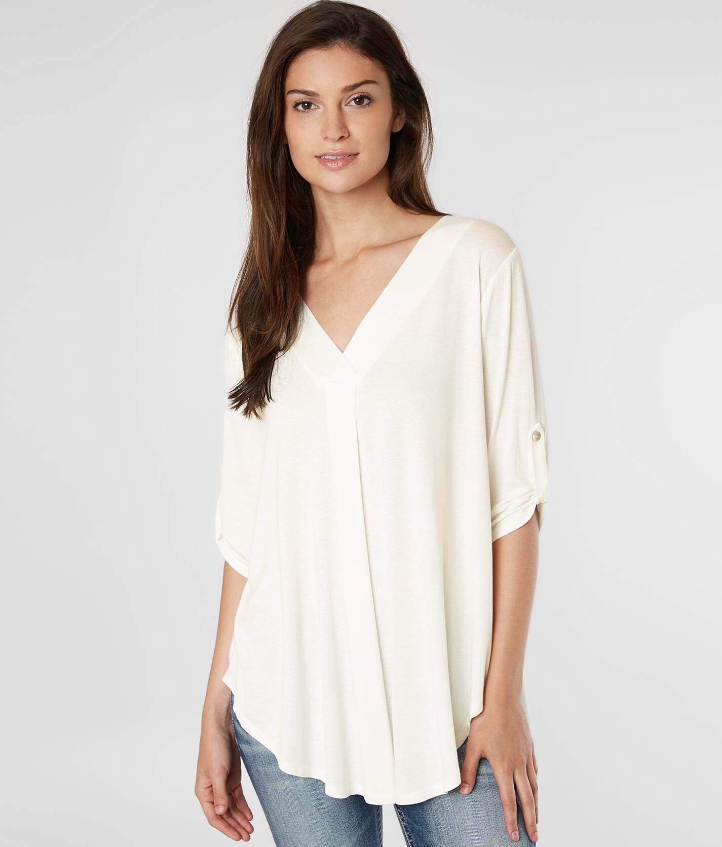 cream flowy top