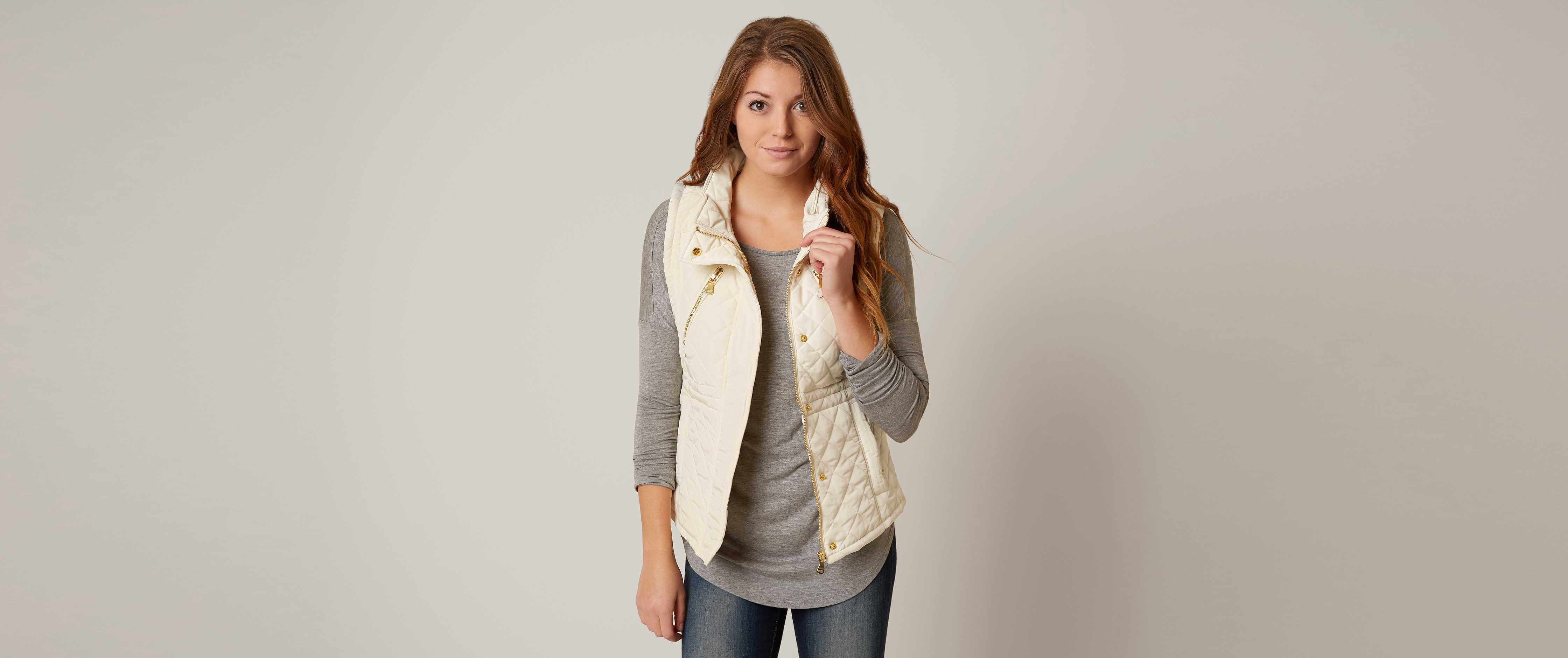 womens cream quilted vest