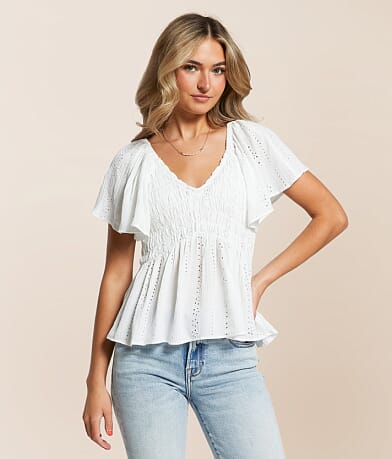 Angie Eyelet Smocked Peplum Top front view
