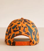 Von Dutch trucker cap in camo with contrast orange logo