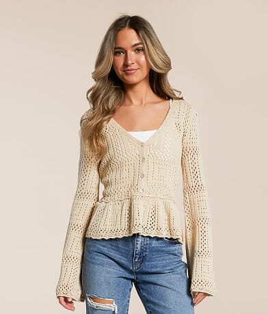 Lumiere Pointelle Peplum Cardigan Sweater front view