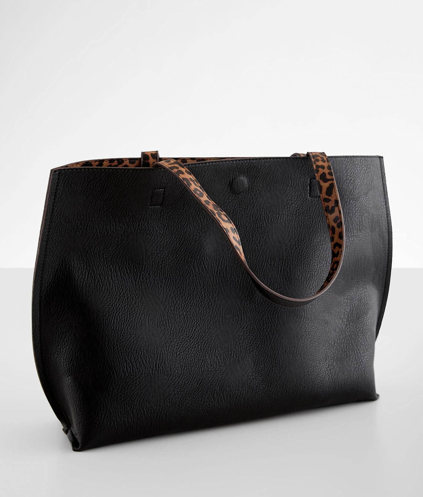 Street level reversible outlet tote