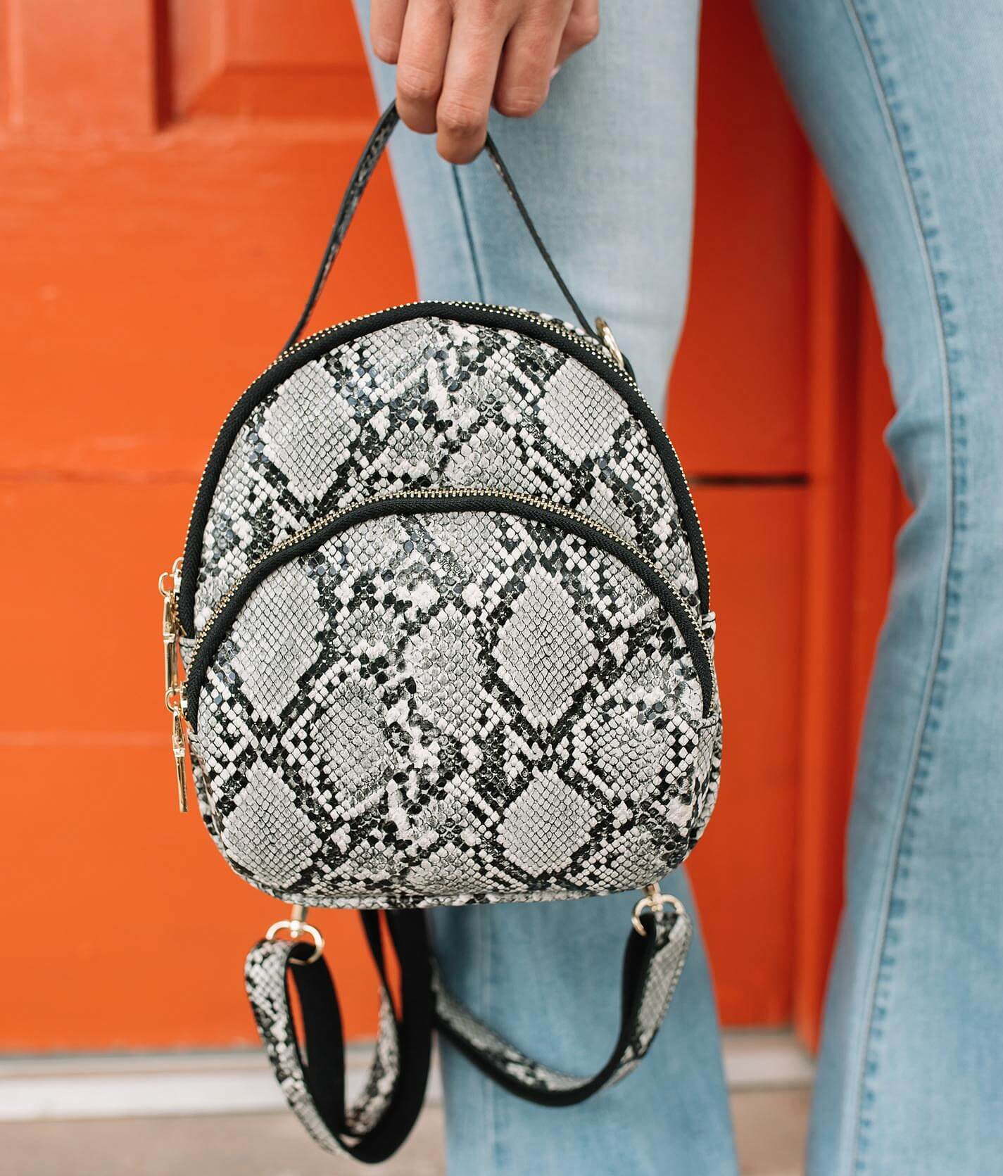 mini snakeskin backpack