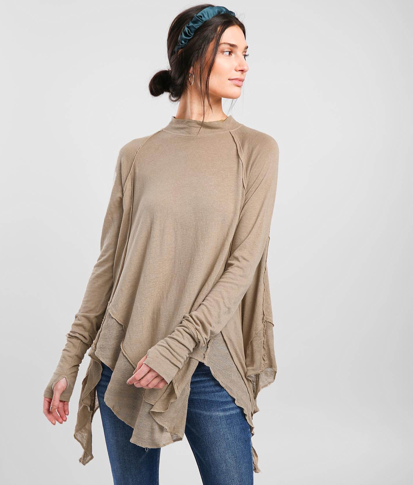 beige ruffle top