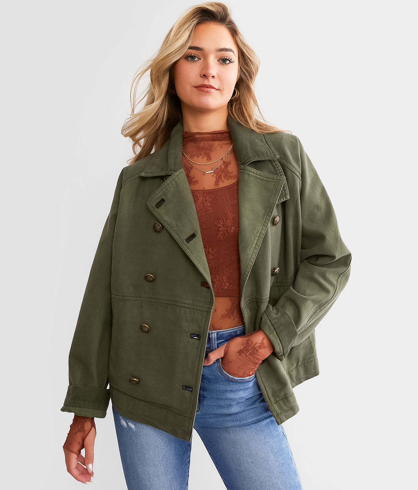 Free People offers Oversized Quilted Jacket Buckle Hobo Mockneck