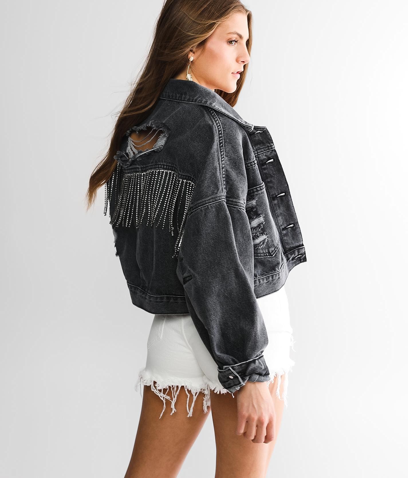 Black denim store jacket with tassels